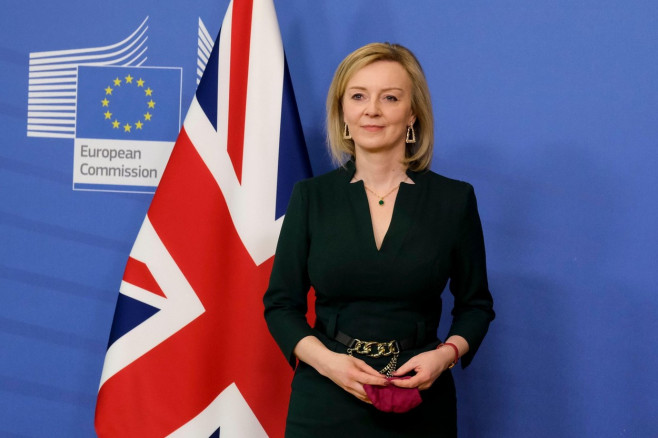 Brussels, Belgium. 21st Feb, 2022. Vice-President of the European Commission Maros Sefcovic welcomes British Foreign Secretary Liz Truss prior to an EU-UK Withdrawal Agreement Joint Committee in Brussels, Belgium on February 21, 2022. Credit: ALEXANDROS M