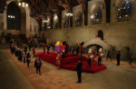 The Queen’s coffin lies in state in Westminster Hall as members of the public file past