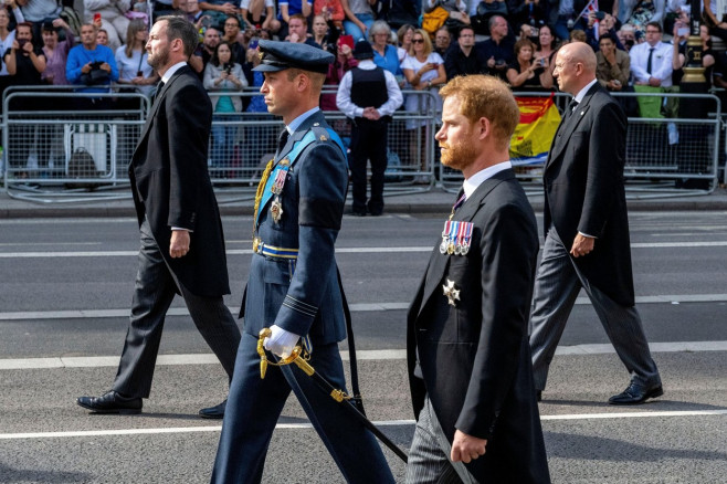 Queen Elizabeth II's coffin is taken in procession Buckingham Palace to Westminster Hall after her death on 8th September 2022.