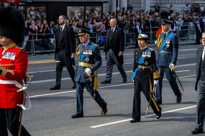 Queen Elizabeth II's coffin is taken in procession Buckingham Palace to Westminster Hall after her death on 8th September 2022.