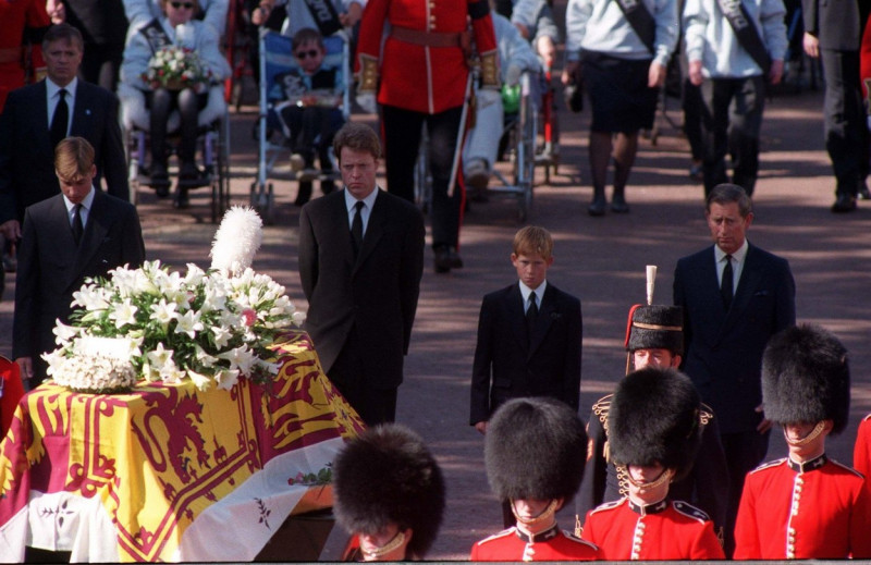 File photo dated 6/9/1997 of Princes William and Harry, the sons of Diana, Princess of Wales, her brother Earl Spencer and her former husband, the Prince of Wales, walking behind her coffin as the funeral procession approaches Westminster Abbey. Issue dat