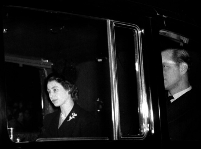 File photo dated 07/02/1952 of the new Queen, Elizabeth II (formerly Princess Elizabeth), returning to Clarence House, London, with the Duke of Edinburgh from London Airport after the sudden death of her father, King George VI. She succeeded the King on h