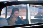 QUEEN ELIZABETH II AND ONE OF HER CORGIS, HEATHROW AIRPORT, LONDON, BRITAIN - OCT 1986