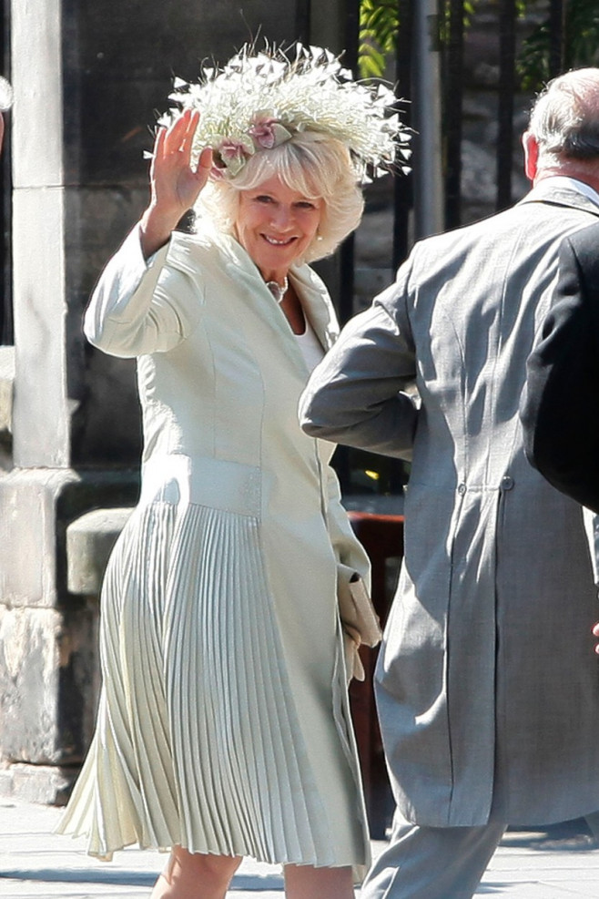 Camilla, Duchess of Cornwall, attends the wedding of Zara Phillips to Mike Tindall at the Canongate Kirk on Edinburgh's historic Royal Mile