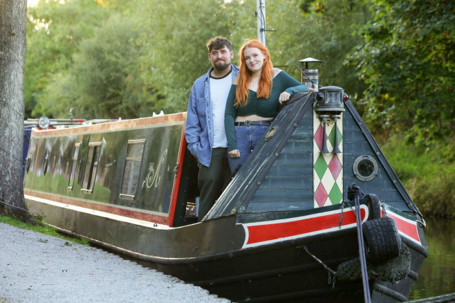 YOUNG COUPLE MOVE ONTO BARGE TO SAVE MONEY ON RISING BILLS