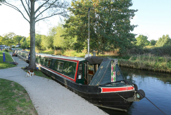 YOUNG COUPLE MOVE ONTO BARGE TO SAVE MONEY ON RISING BILLS