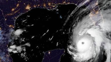 This National Oceanic and Atmospheric Administration (NOAA) satellite handout image shows tropical Hurricane Ian over Cuba, on September 27, 2022