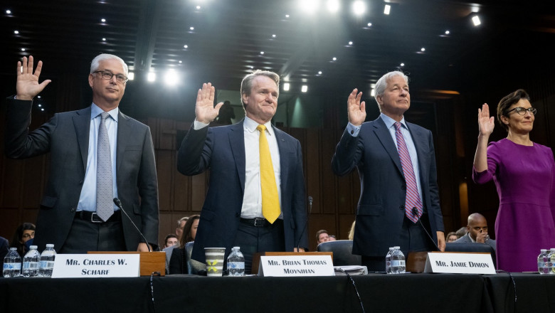 (L-R) Charles Scharf, CEO and President of Wells Fargo, Brian Thomas Moynihan, Chairman and CEO of Bank of America, Jamie Dimon, Chairman and CEO of JPMorgan Chase, and Jane Fraser, CEO of Citigroup, are sworn in as they prepare to testify during a Senate Banking