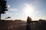 Sailors assigned to the first-in-class aircraft carrier USS Gerald R. Ford (CVN 78) and the "Tridents" of Helicopter Sea Combat Squadron (HSC) 9 conduct an ammunition onload, Sept. 25, 2022. Ford is underway in Atlantic Ocean conducting carrier qualificat