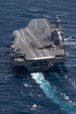 USS Gerald R. Ford (CVN 78) transits the Atlantic Ocean, March 23, 2022. Ford is underway in the Atlantic Ocean conducting flight deck certification and air wing carrier qualifications as part of the ships tailored basic phase prior operational deployment