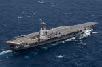 USS Gerald R. Ford (CVN 78) transits the Atlantic Ocean, March 23, 2022. Ford is underway in the Atlantic Ocean conducting flight deck certification and air wing carrier qualifications as part of the ships tailored basic phase prior operational deployment