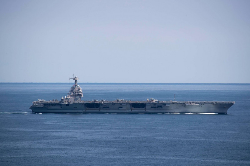 USS Gerald R. Ford (CVN 78) transits the Atlantic Ocean, March 30, 2022. Ford is underway in the Atlantic Ocean conducting flight deck certification and air wing carrier qualification as part of the ships tailored basic phase prior to operational deployme