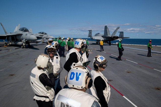 Distinguished visitors observe flight operations aboard USS Gerald R. Ford (CVN 78), Sept. 17, 2022. Ford is underway in the Atlantic Ocean conducting carrier qualifications and workups for a scheduled deployment this fall. (U.S. Navy photo by Mass Commun