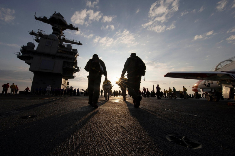 Sailors assigned to USS Gerald R. Ford (CVN 78) conduct a foreign object debris walkdown prior to T-45C Goshawk flight operations, June 19, 2022. Ford is underway in the Atlantic Ocean conducting Chief of Naval Air Training Command (CNATRA) carrier qualif
