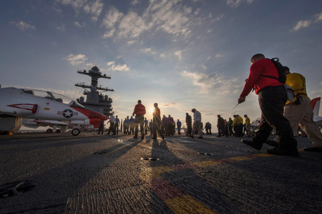 Sailors assigned to USS Gerald R. Ford (CVN 78) conduct a foreign object debris walkdown prior to T-45C Goshawk flight operations, June 19, 2022. Ford is underway in the Atlantic Ocean conducting Chief of Naval Air Training Command (CNATRA) carrier qualif