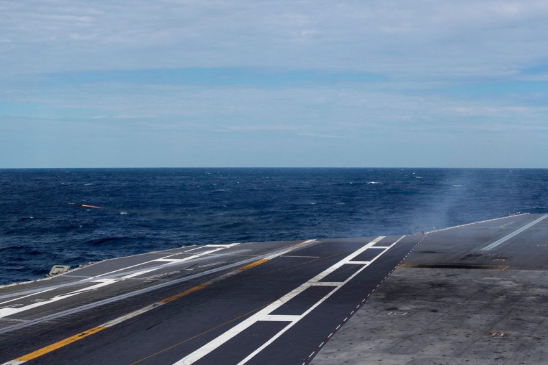 A rolling airframe missile (RAM) launcher fires a RIM-116 missile from the first-in-class aircraft carrier USS Gerald R. Ford (CVN 78) during a combat systems training exercise, Sept. 24, 2022. Ford is underway in the Atlantic Ocean conducting carrier qua