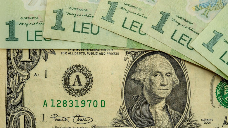 bankotes of romanian leu ron and dollar exchange concept