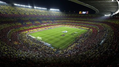 Spectatori pe stadionul Camp Nou.
