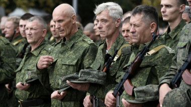 russian Men conscripted for military service during partial mobilisation attend a ceremony