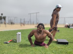 EXCLUSIVE: Strong Man Zion Clark An Inspirational Wrestler Plays With His Puppy At The Beach