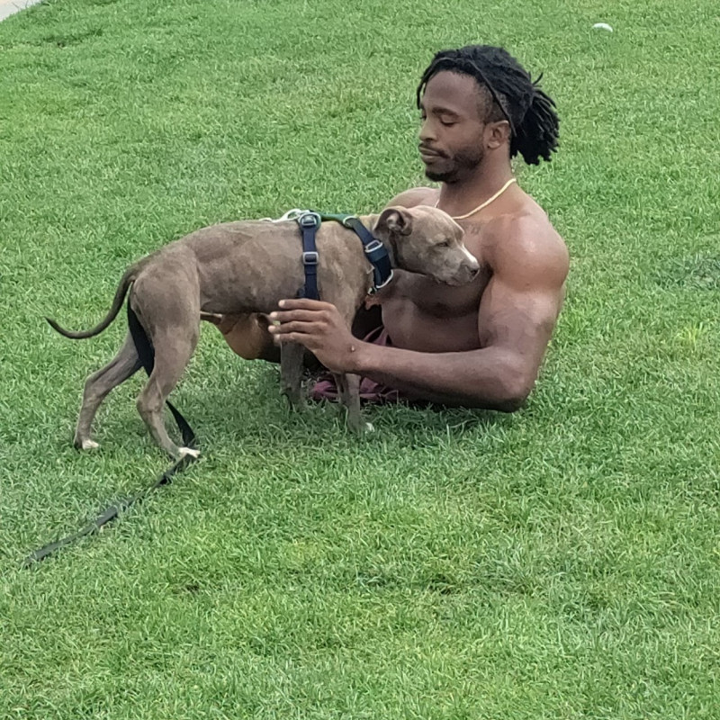 EXCLUSIVE: Strong Man Zion Clark An Inspirational Wrestler Plays With His Puppy At The Beach