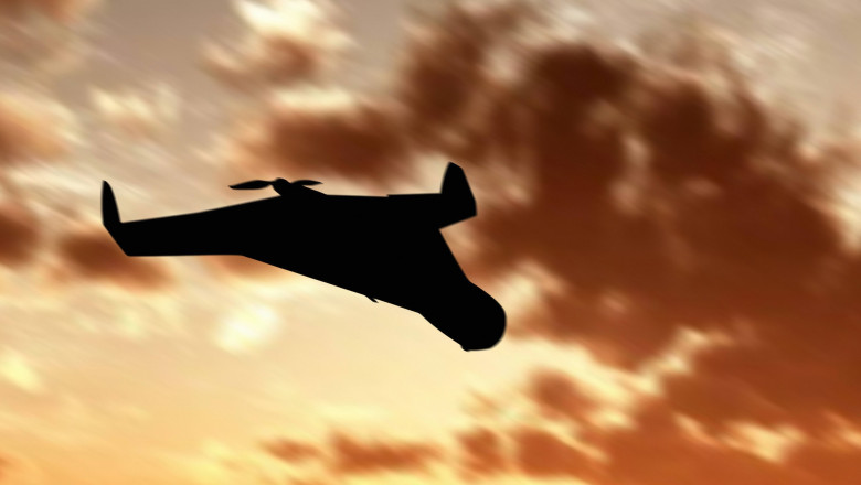 Silhouette of an Iranian military unmanned aerial vehicle at sunset