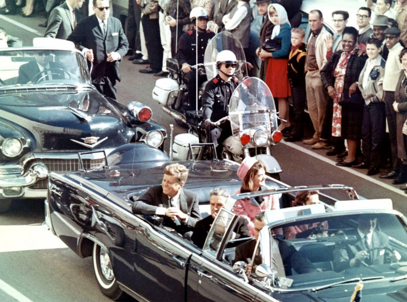 JOHN F. KENNEDY (1917-1963) with his wife Jacqueline moments before he was killed in Dallas on 22 November 1963. Photo: Walt Cisco