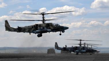 Russian Kamov Ka-52 "Alligator" reconnaissance and attack helicopters are seen at an airfield before a combat mission in the course of Russia's military operation in Ukraine