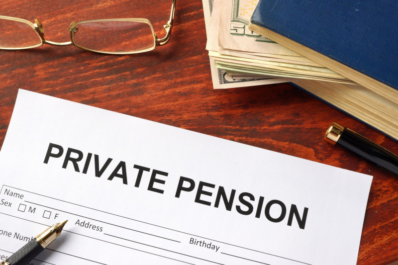 Private pension form on an office table.