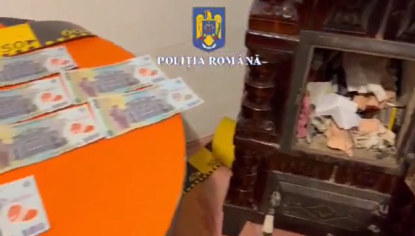 Angajatul Poștei ascunsese o parte din banii furați în sobă