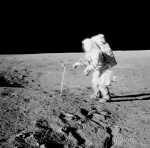 (20 Nov. 1969) --- Astronaut Alan L. Bean, lunar module pilot, drives a core sample tube into the lunar surface during the Apollo 12 extravehicular activity. Good view of lunar soil.