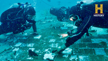underwater explorer and marine biologist Mike Barnette and wreck diver Jimmy Gadomski exploring a twenty-foot segment of the 1986 Space Shuttle Challenger discovered in the waters off the coast of Florida