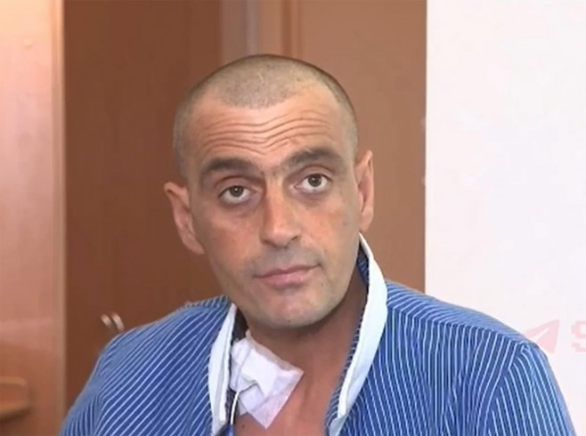 Nikolay Pasenko, 41, a junior sergeant, rescued after being injured by unexploded ordnance.