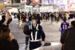 Japanese football fans celebrate Japan's victory at the FIFA World Cup