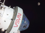 Earth Orbit, Earth Orbit. 20 November, 2022. Selfie of the Orion crew capsule with the Moon in the upper right as it positions for a lunar orbit, on flight day five of the NASA Artemis I mission, November 20, 2022, in Earth Orbit. The image was captured b