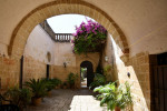Entrance arch in a old house in Presicce, a village in the Puglia region in Italy.