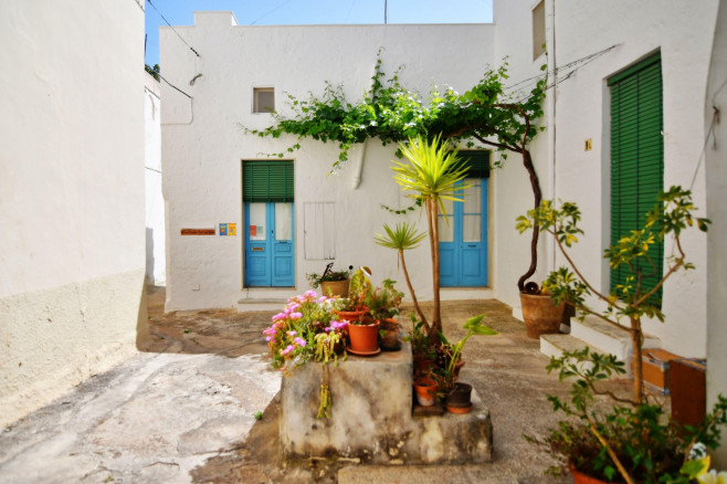 Entrance arch in a old house in Presicce, a village in the Puglia region in Italy.