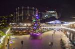 London, UK. 18th November 2022. Christmas tree at Coal Drops Yard shopping and restaurant complex in King's Cross.