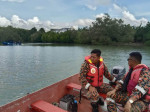 One-year-old boy eaten alive by crocodile and father attacked while rowing in Malaysia