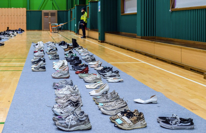 Seoul, South Korea. 02nd Nov, 2022. Personal belongings retrieved by police from the scene of a fatal Halloween crowd surge that killed more than 150 people in the Itaewon district are displayed at a gymnasium for relatives of victims to collect, in Seoul