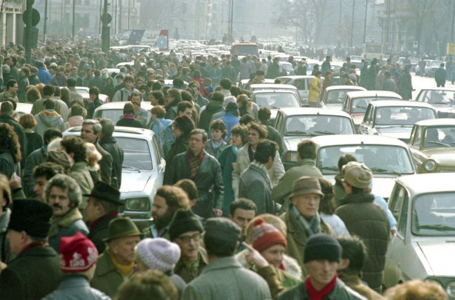 Bucharest, Romania, January 1990. People and vehicles in downtown Bucharest, a few weeks after the anti-communist revolution of December 1989.