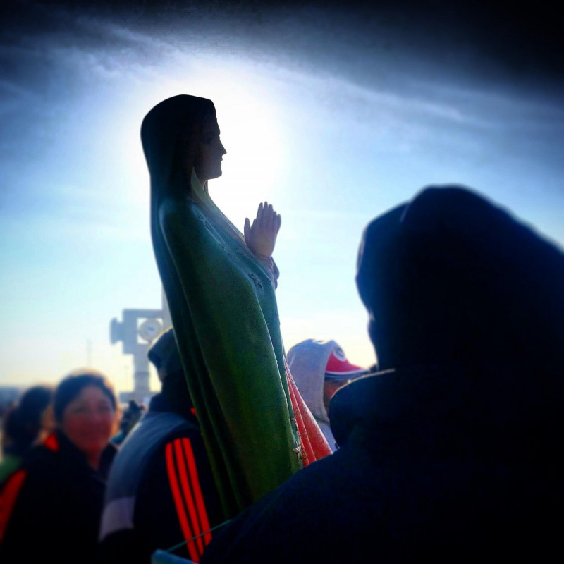 Pilgrims carry an image of Our Lady of Guadalupe during the annual pilgrimage to Nuestra Señora de Guadalupe basilica in Mexico City, Mexico