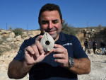 An Archeologist For The Israel Antiquities Authority Holds A Clay Lamp Found Outside The Salome Cave In The Lachish Forest