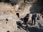 A Worker Excavates Outside The Entrance To The Salome Cave In The Lachish Forest