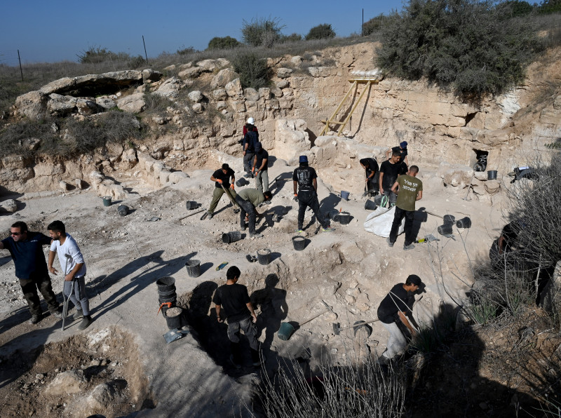 Workers Of The Israel Antiquities Authority Dig Outside The Salome Cave In The Lachish Forest