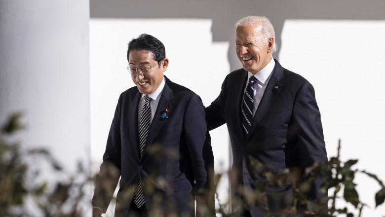 US President Joe Biden and Prime Minister of Japan Kishida Fumio walk though the colonnade of the White House in Washington, DC