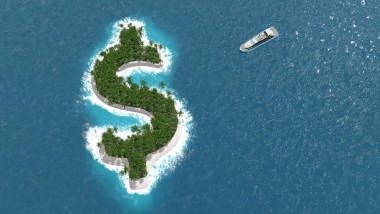 O ambarcaţiune de lux se îndreaptă spre o insulă de forma simbolului dolarului