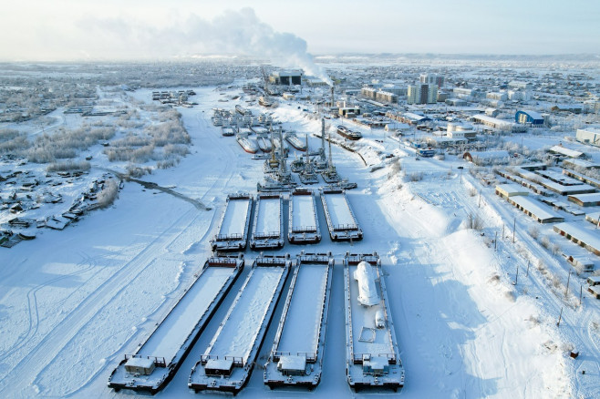 Ships under repair in winter at Zhatay Shipyard in Yakutia, Russia