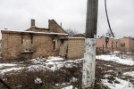 clădire distrusă parțial de bombardamante în Ucraina