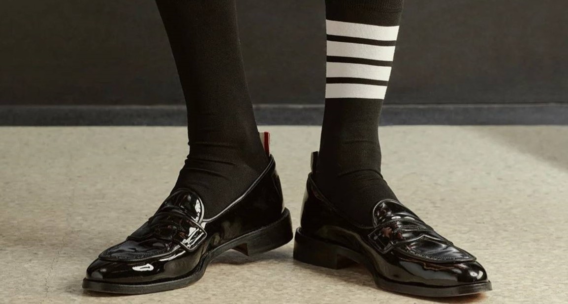 Adidas a pierdut procesul legat de celebrele sale dungi, în favoarea unui brand de lux